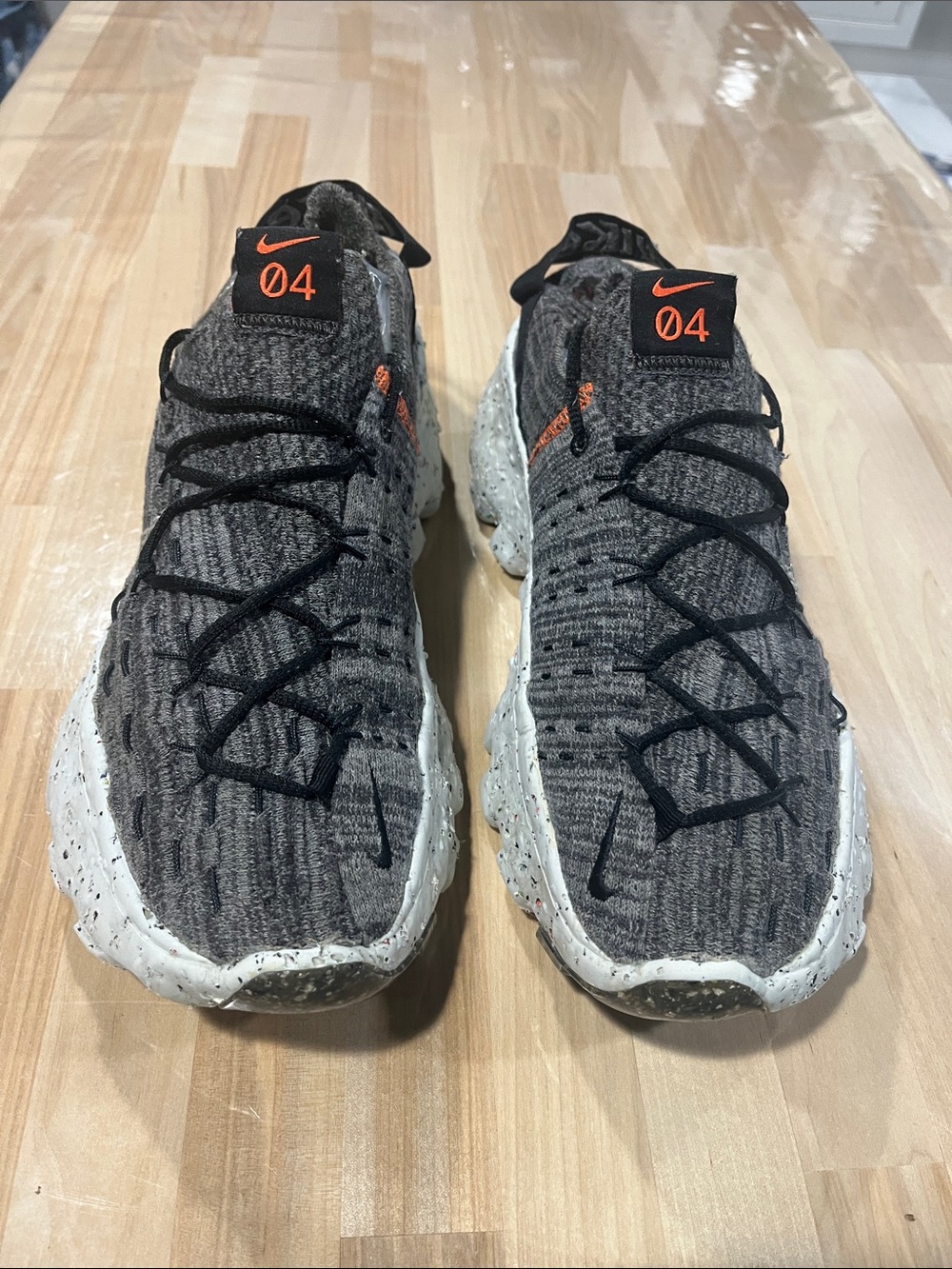 Nike Women’s shoes Gray Knit Sneakers with Black Laces and Orange Accents